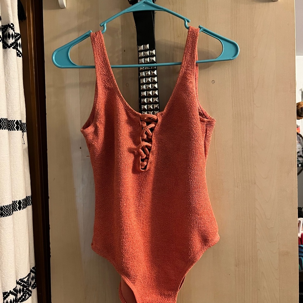 L- Vigoss Orange Bodysuit One Piece with Lace-Up Detail
